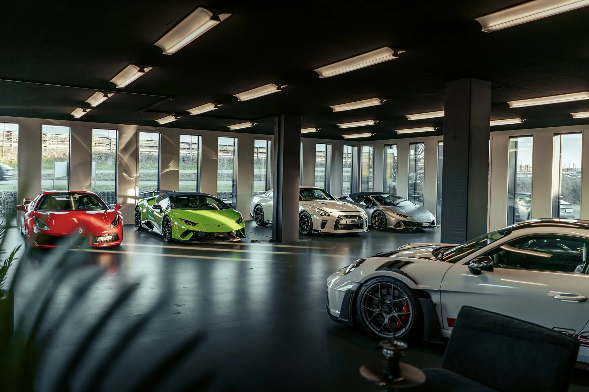 Performance-Cars showroom in Widnau with Ferrari, Lamborghini, Nissan GT-R and Porsche